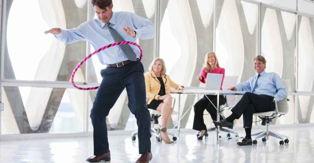 businessman hoola hooping