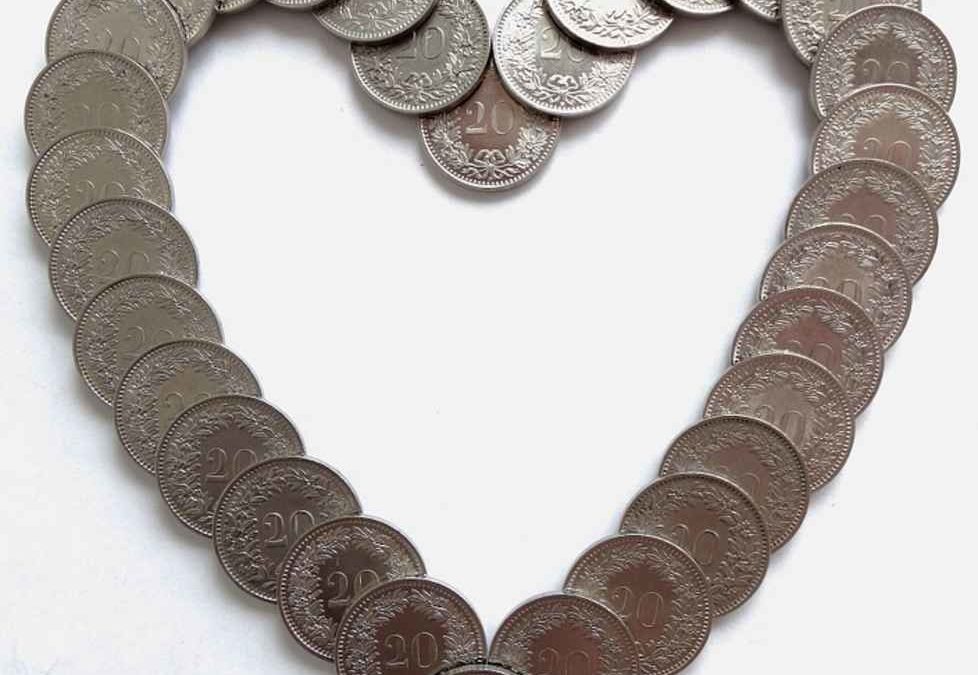 coins arranged in a heart shape