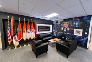 US Army Command lounge area in lobby with electronic display