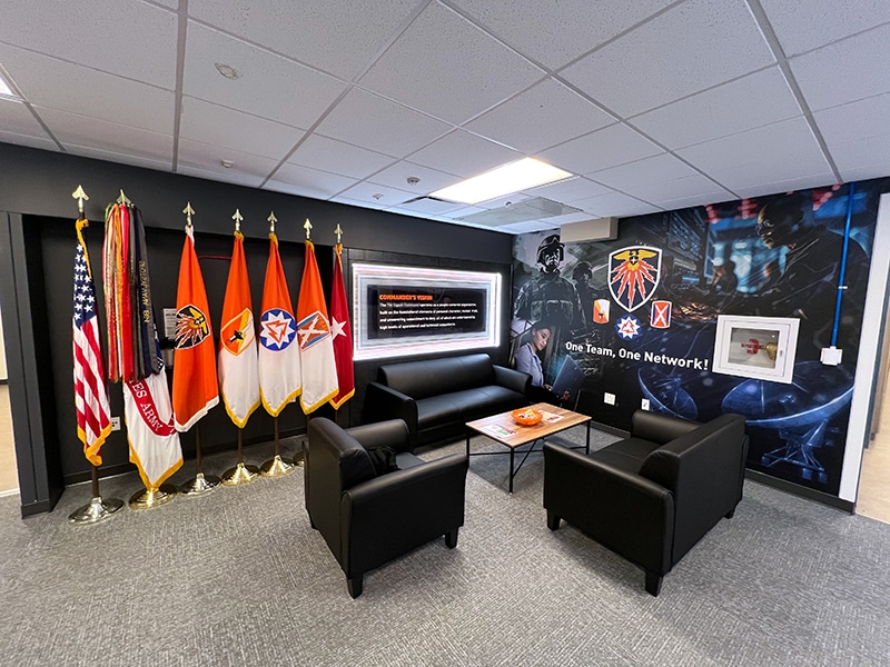 US Army Command lounge area in lobby with electronic display